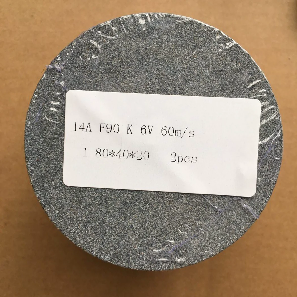 Shrink-wrapped wheel with a specification label